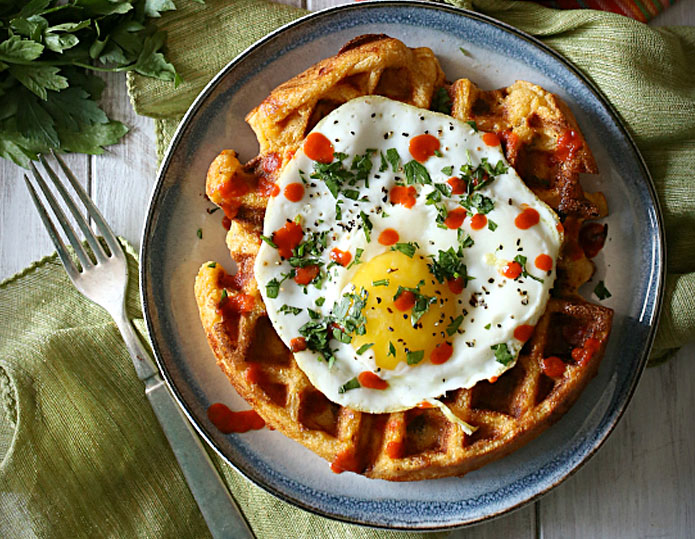 This hearty waffle is bursting with shredded cheese, bold spices and ...